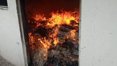 Photo of A pile of garbage caught on fire in a flat